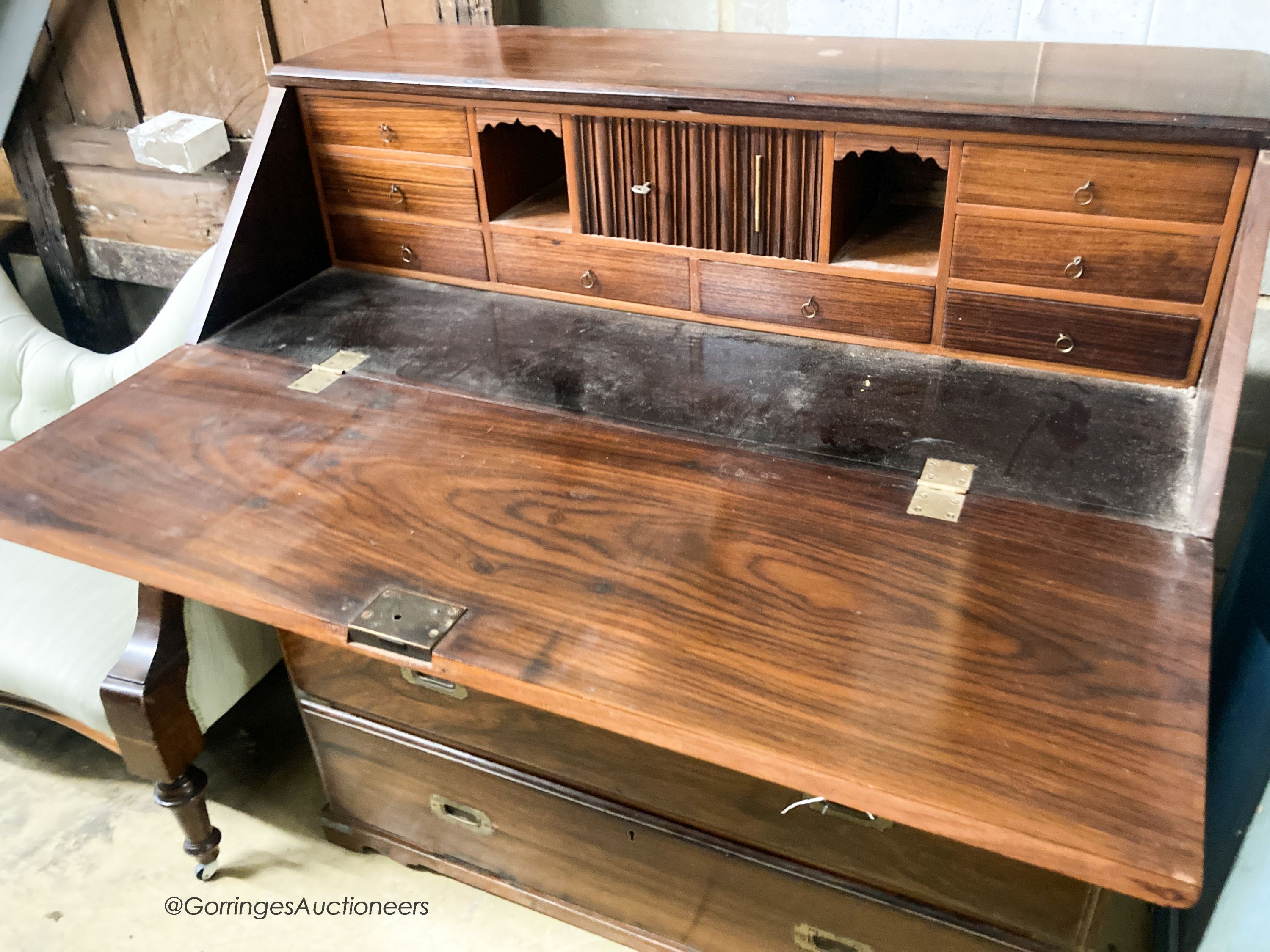 An early 20th century Anglo Indian rosewood campaign style two part bureau with brass recessed handles, width 100cm, depth 46cm, height 106cm